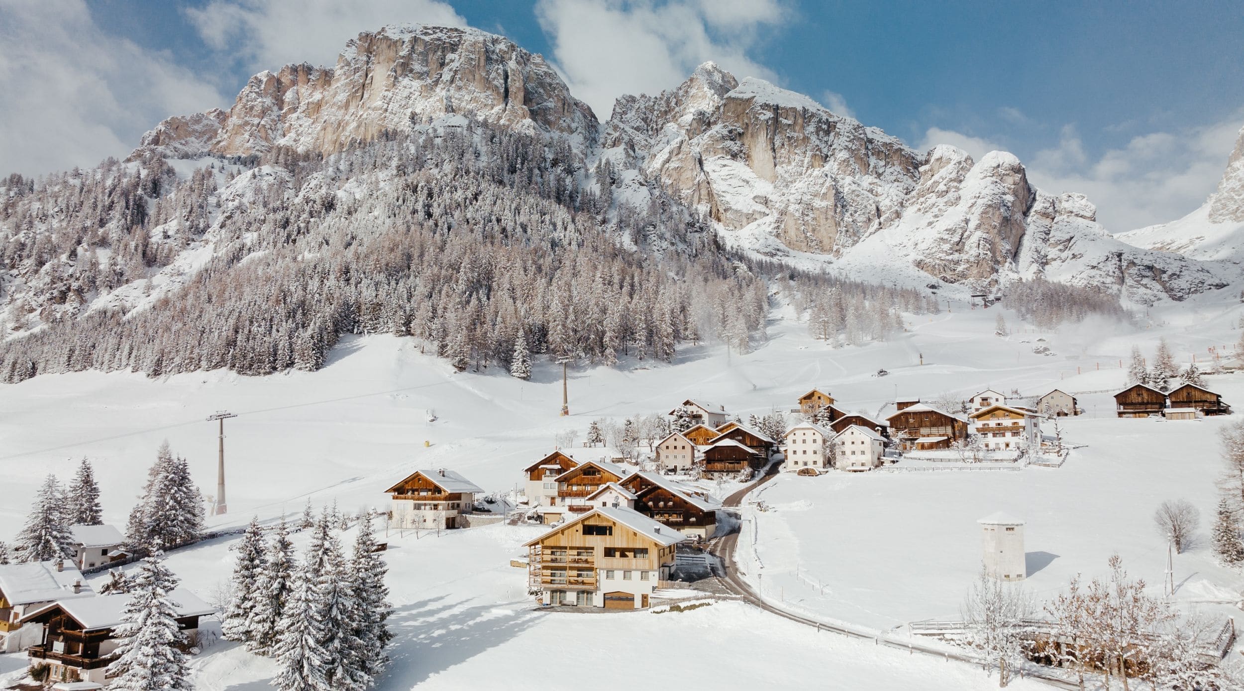 The village of Colfosco with the Sassongher from above