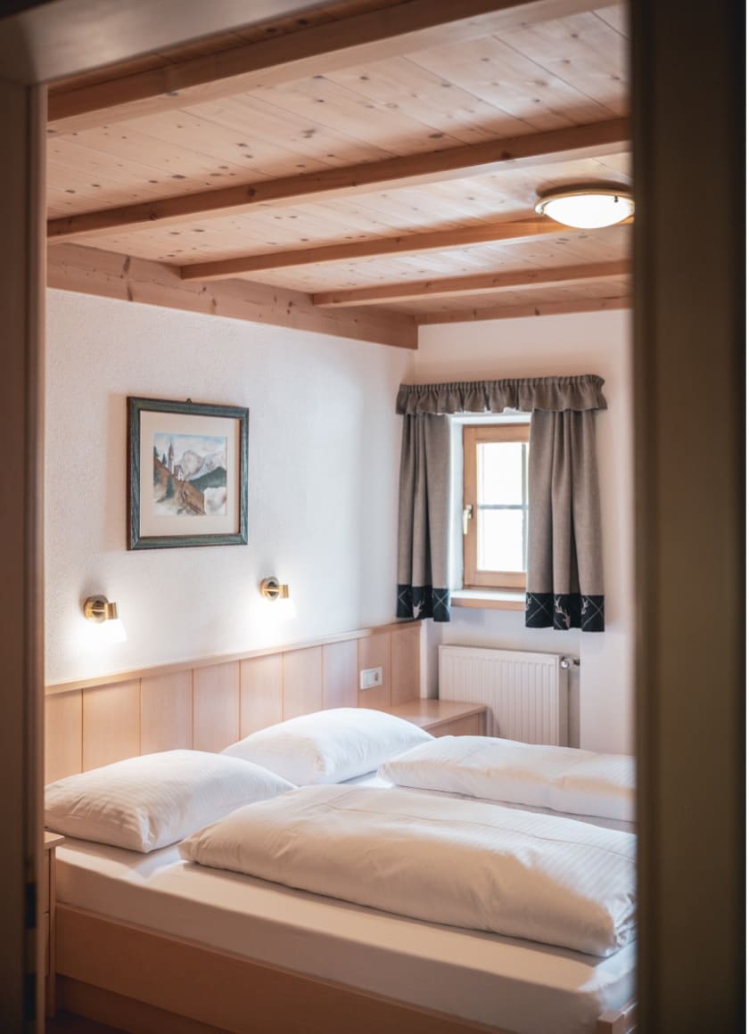 The village of Colfosco with the Sassongher from above